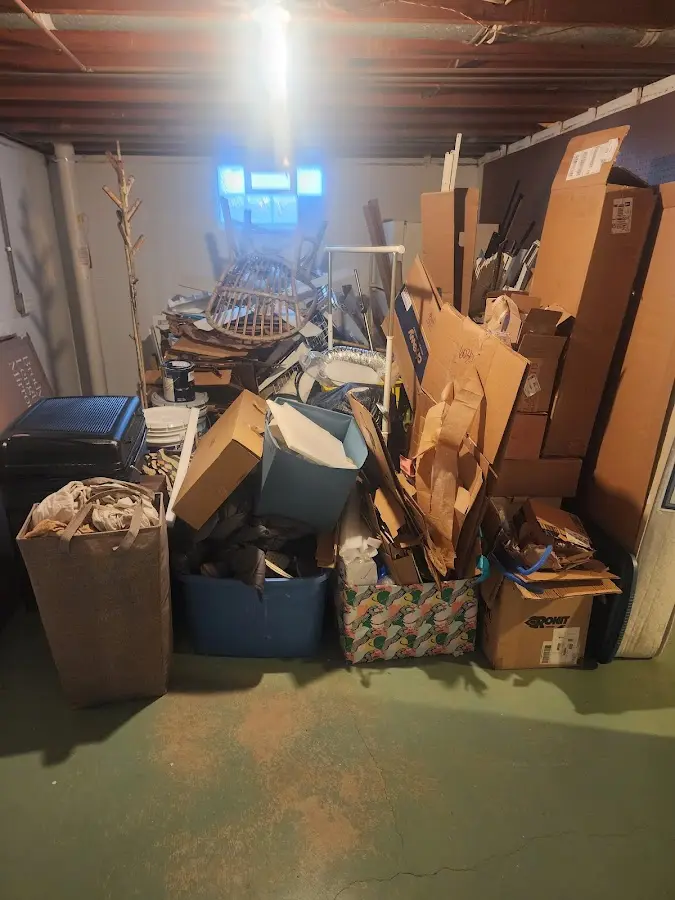 Roll-off dumpster container at job site for 8 Yard Dumpster Rental in Yankee Springs